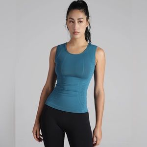 Never worn ALWAYS-IN-MOTION TANK YELLA